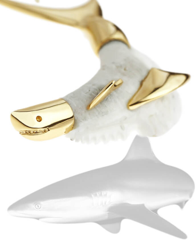 sharks tooth set in gold with grey shark