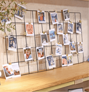 wall display of post card images and notes