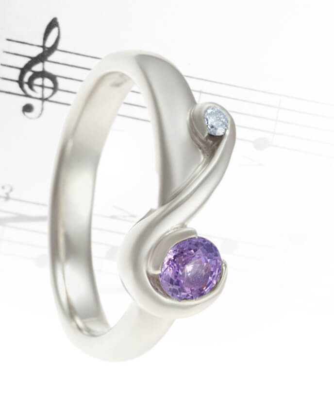 treble clef shaped purple stone and silver ring