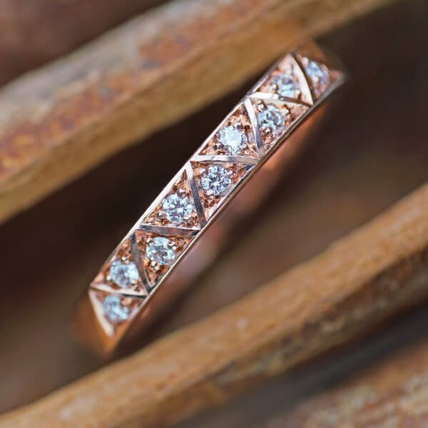 zig zag lined diamond and rose gold eternity ring