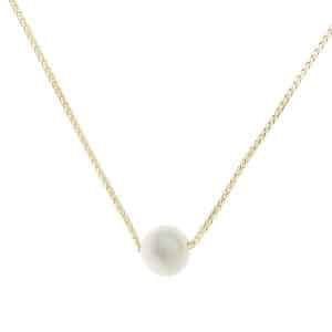 Single pearl on gold chain