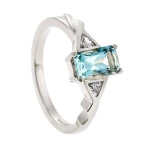 White gold twist band ring with aquamarine