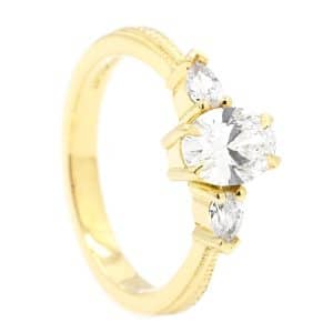 Yellow gold diamond trilogy ring