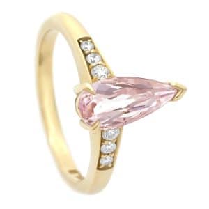 Long pear cut pink gemstone gold band