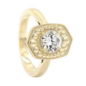 Diamond in shield and beading ring design