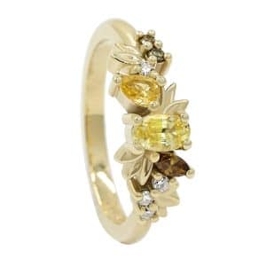 Floral inspired ring with yellow and brown gemstones