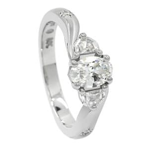 Curved trilogy white metal diamond ring