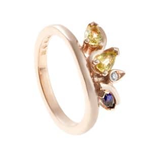 Rose gold ring with pear cut gemstones