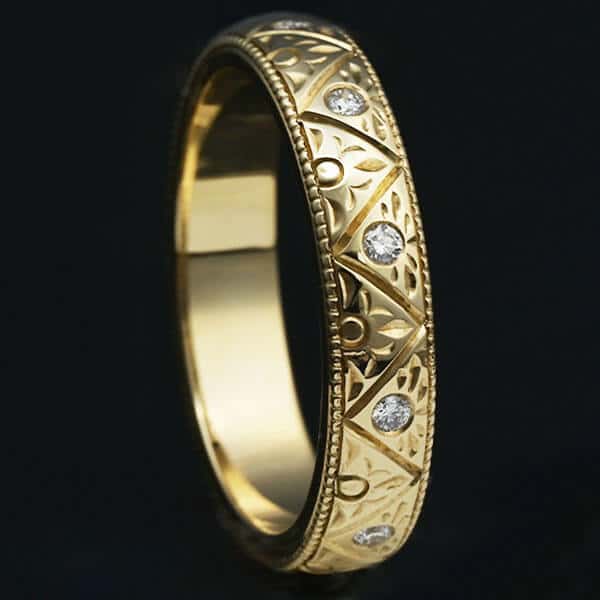 engraved diamond and gold wedding ring