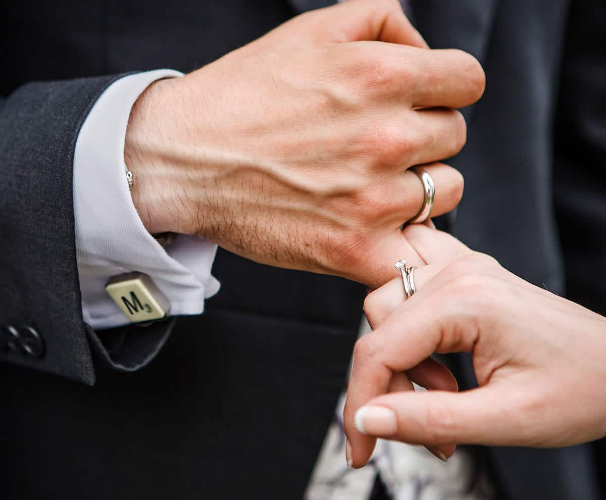 wedding couple hands linked