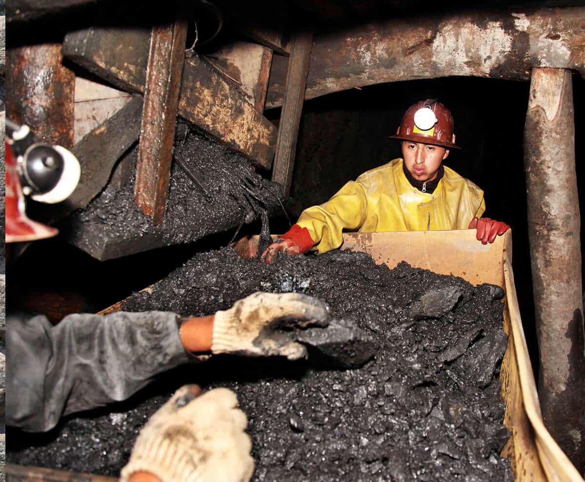 Fairtrade miner moving rocks