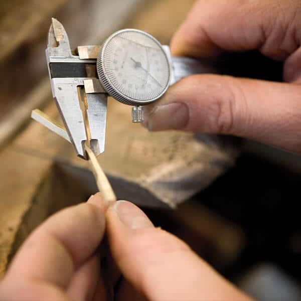 precious metal wire being measured