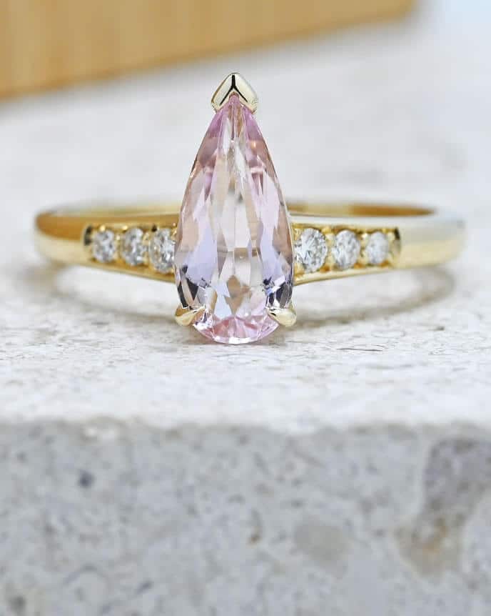 Fairtrade dress ring with long morganite diamonds and gold