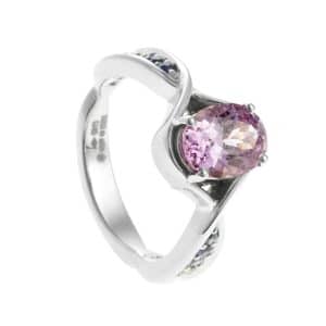 Ring with oval cut lilac sapphire