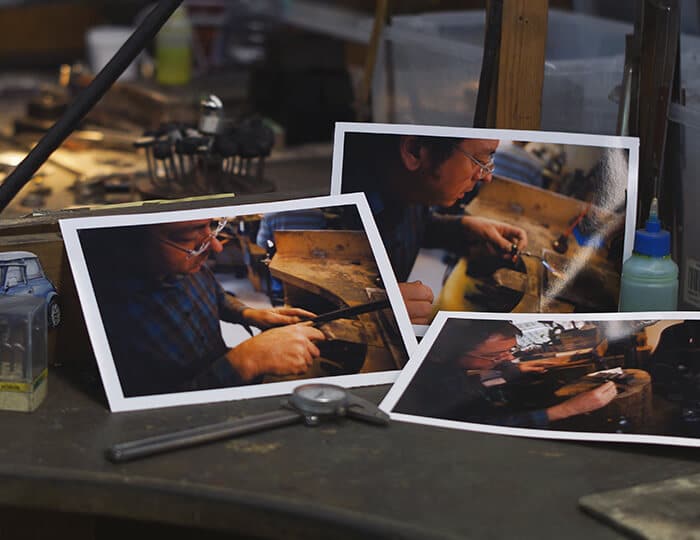 Bespoke jewellery making souvenir photos on jewellery work bench