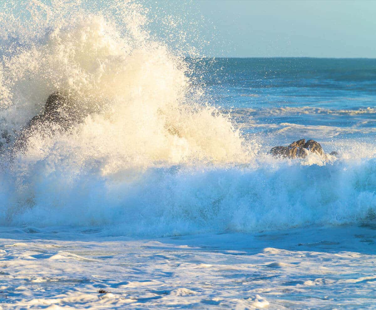 wave crashing on rock