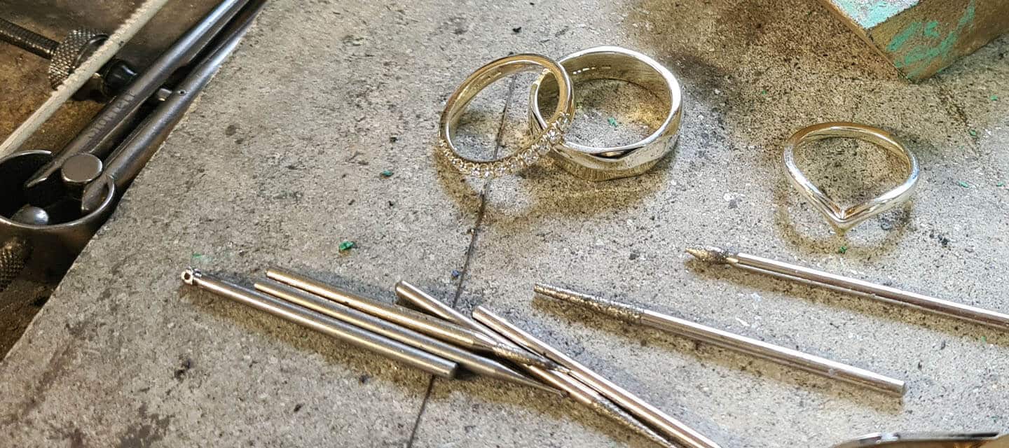 white metal rings on bench