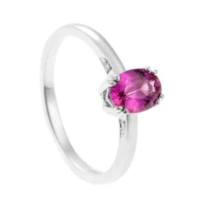 Pink sapphire ring in white metal