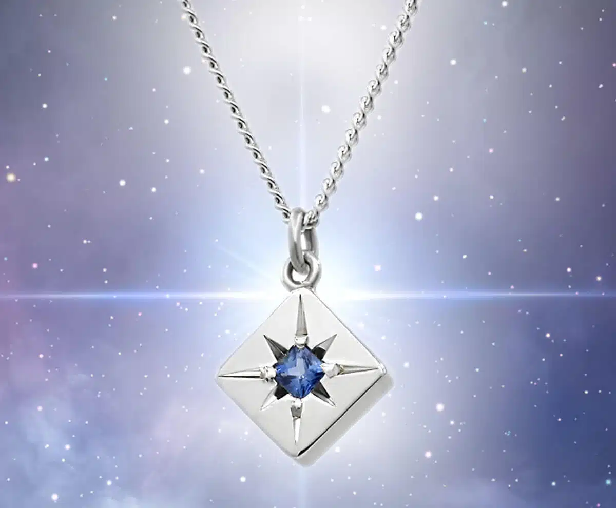 Sapphire pendant with space scene