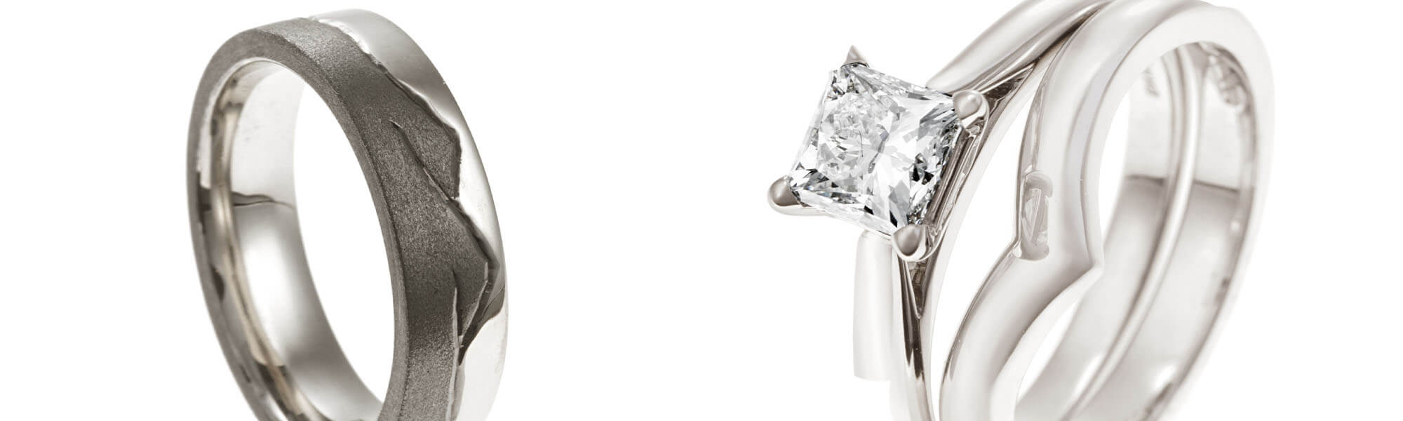 pair of rhodium plated rings black and white