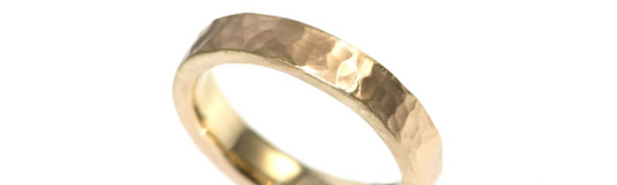 wedding band with a roman effect finish