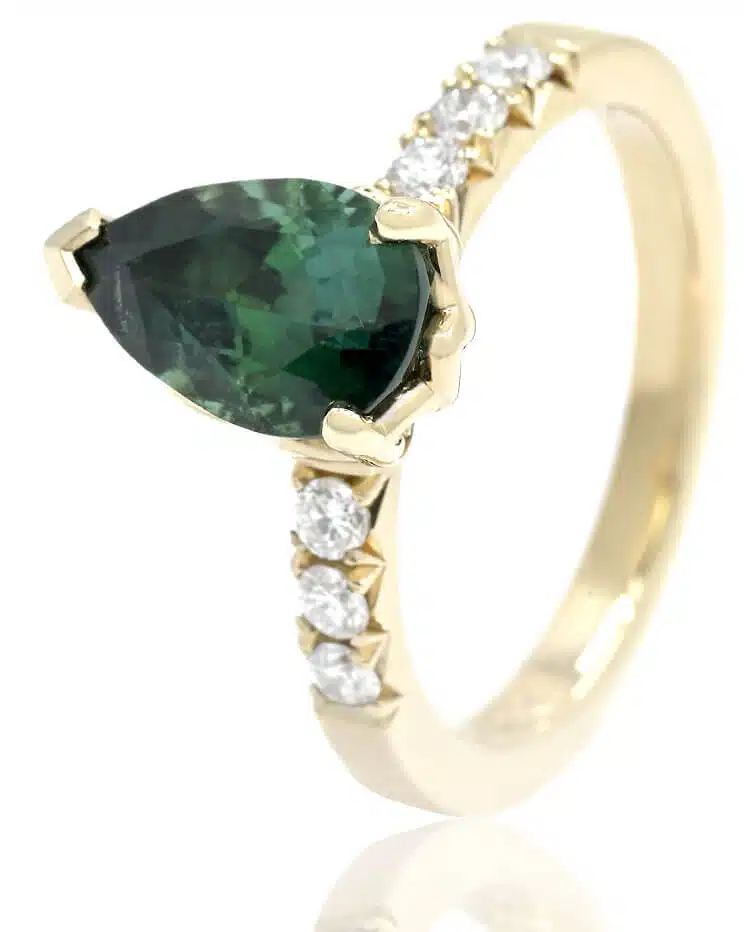 green pear shaped sapphire ring