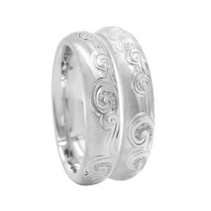 Fibonacci swirl engraved matching rings 